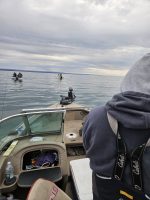 A few boats on Lake Erie fishing for perch in the Spring.