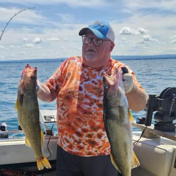 Paul Doc Soper shows off a brace of Lake Erie Walleye